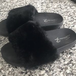 Black fuzzy slides